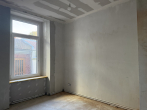Zimmer im EG - Mehrfamilienhaus zur Sanierung in der Freiburger Altstadt