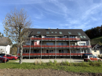 Seitenansicht - Vermietete 3-Zimmer-Wohnung im 1.OG mit großem Balkon und KFZ-Stellplatz im Freien