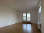 Wohnzimmer - Hochwertige, bezugsfreie 2-Zimmer-Wohnung mit großer Terrasse & TG-Stellplatz
