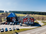 Front (2) - Projektentwicklung von acht Chalets mit Hotelbetrieb im Herzen des Schwarzwalds